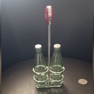 Vintage coke salt and pepper shaker with holder